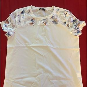 Silky feel top w/ mesh shoulder finish